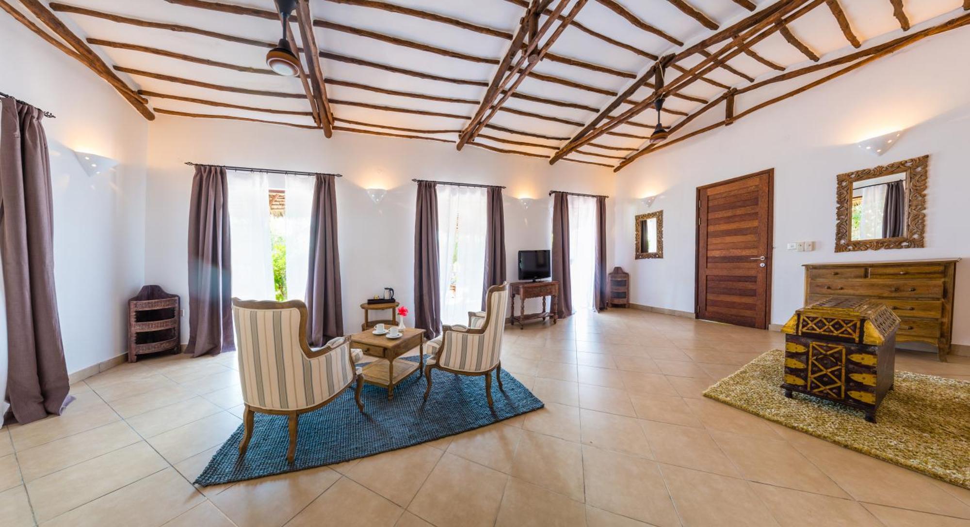 Konokono Beach Resort And Isaraya Luxury Overwater Villas Michamvi Oda fotoğraf